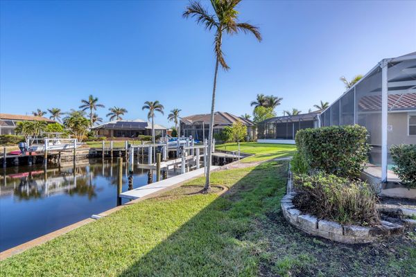 Backyard leading to boat dock and canal (Boat lift not available)