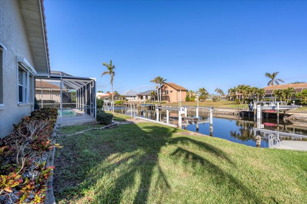 Backyard leading to boat dock and canal (Boat lift not available)