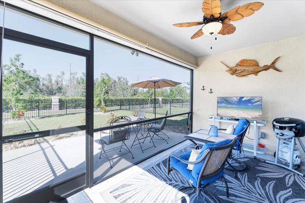 Enclosed patio overlooking fenced backyard