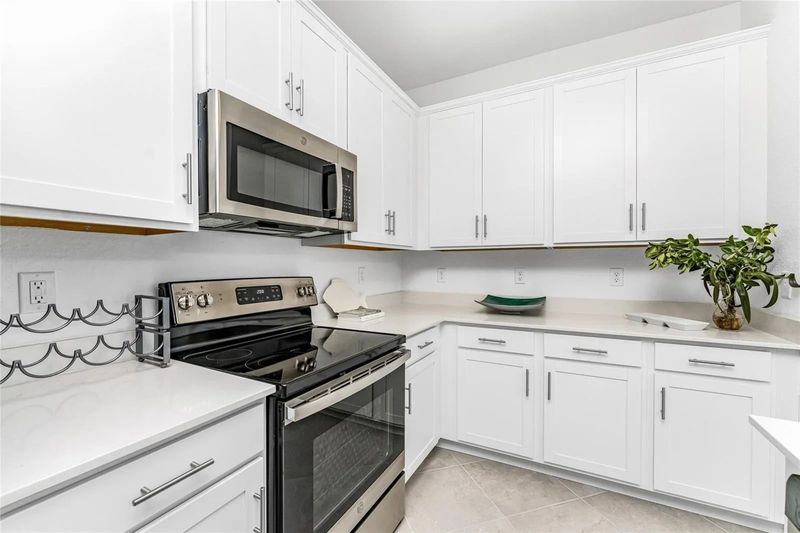 Beautiful, full-equipped kitchen overlooking living and dining areas
