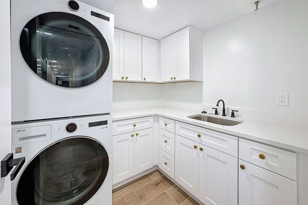 Laundry Room with full size LG ThinQ washer and dryer