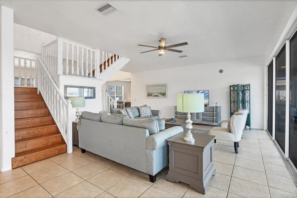 Beautiful, bright, open living space with fantastic view of the pool area and canal beyond. Living room also features a secret Harry Potter room under the staircase