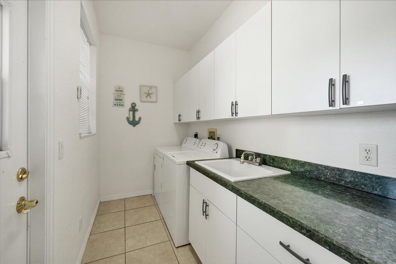 Laundry room with full-size washer & dryer