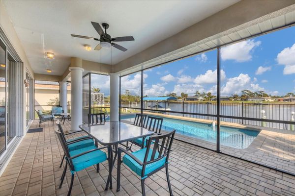 Covered lanai overlooking the pool and canal (Boat lift not available)