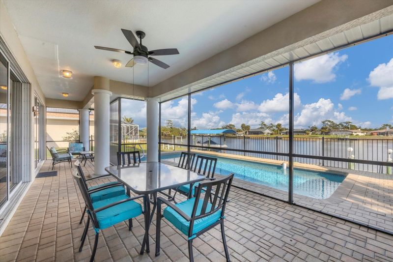 Covered lanai overlooking the pool and canal (Boat lift not available)