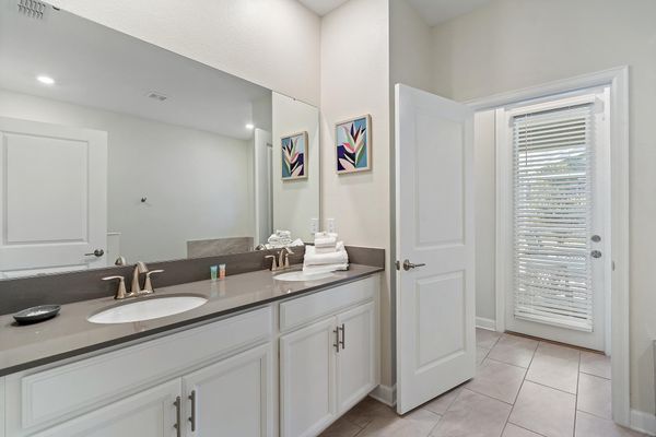 Master King Bathroom 1 Downstairs / Door to Pool