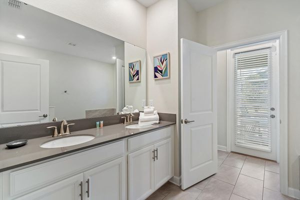 Master King Bathroom 1 Downstairs / Door to Pool