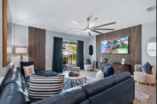 Gather in the spacious living room, designed with comfort in mind and ideal for entertaining guests or enjoying family time.