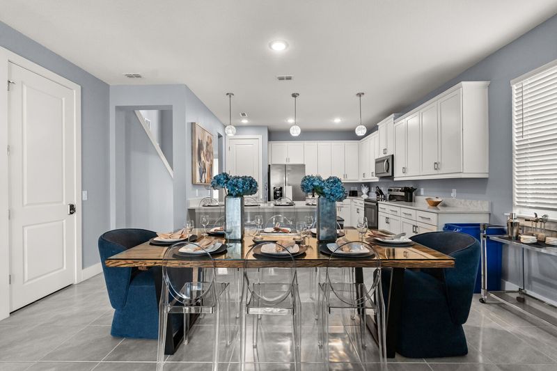 Dine in style at the formal dining table, which comfortably seats 10 guests for any occasion