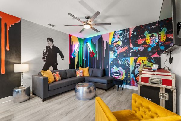 Gather in the 2nd floor loft area, a versatile space perfect for lounging, watching movies, or enjoying casual conversations