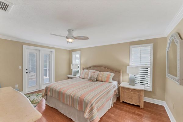 Primary Bedroom With King Bed, Attached Bathroom & Lanai Access