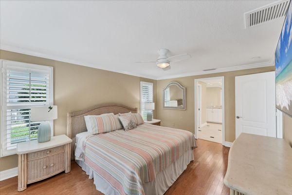 Primary Bedroom With King Bed, Attached Bathroom & Lanai Access