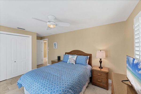 Guest Bedroom 1 With Queen Bed And Lanai Access