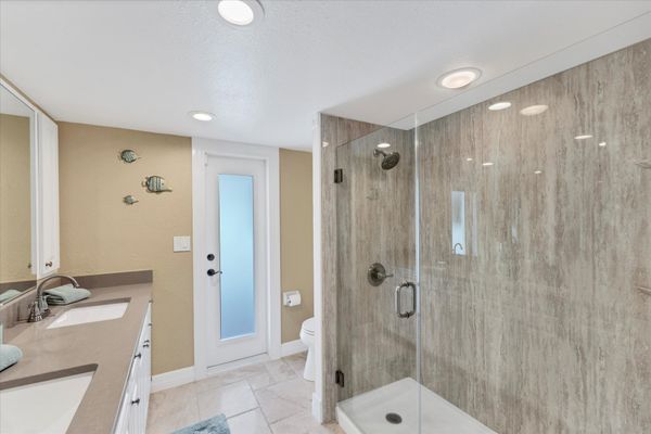 Guest Bathroom Double Vanity, Walk-In Shower and lanai access