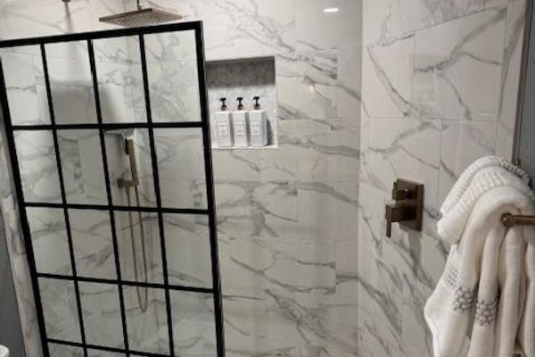 Guest bedroom 4's attached bathroom with walk-in shower