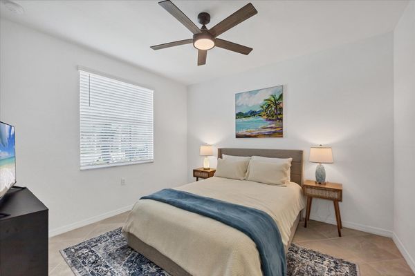 Bedroom #2 with queen bed and 50-inch Smart TV