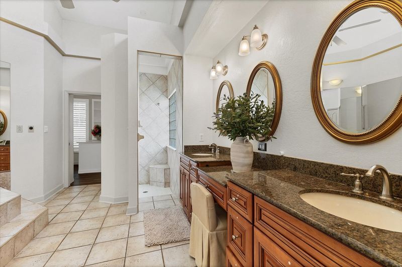 Ensuite includes a walk-in shower, double vanities, and a bathtub