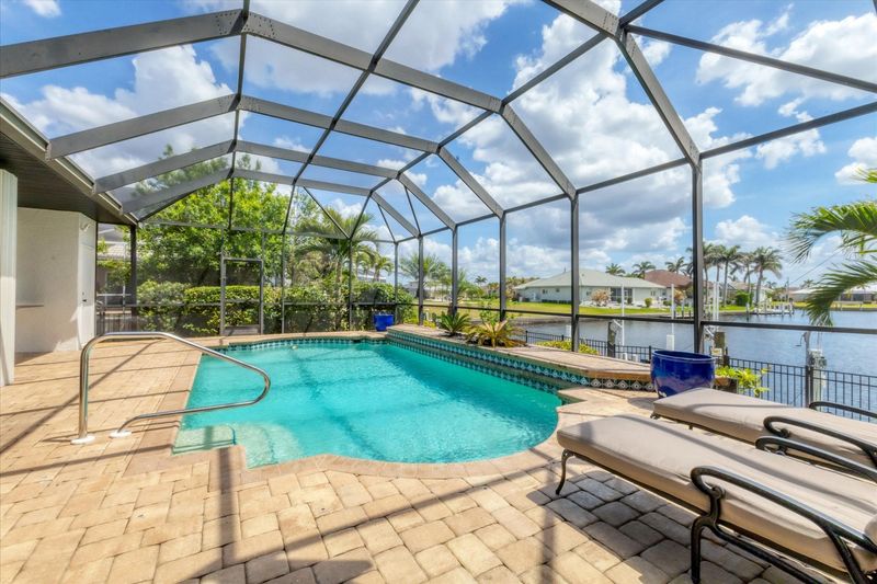 Soak up the beautiful Florida sunshine in your own private pool along the canal waters