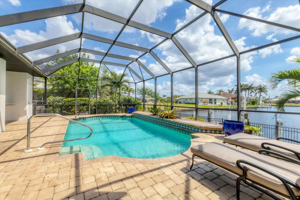 Soak up the beautiful Florida sunshine in your own private pool along the canal waters