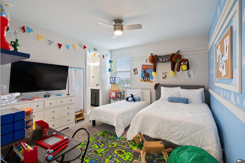 Twin/Double Bedroom 8 Upstairs Shared Bathroom (6) 55" Roku TV Toy Story