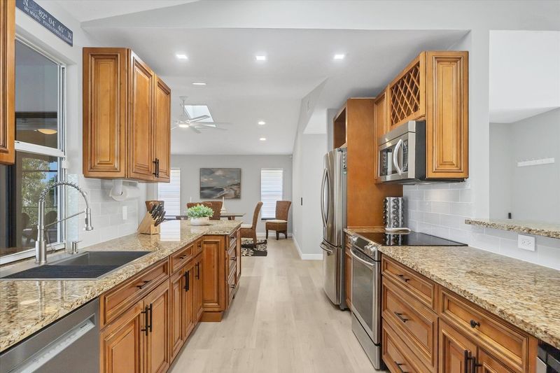 Fully-Equipped kitchen with plenty of counter-top space and new stainless-steel appliances