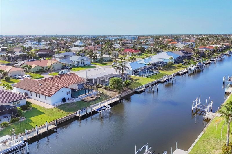 Beautiful 3-Bedroom, 2-Bathroom Canal-front home with Private West facing Pool in Punta Gorda, FL (Boat lift not available)