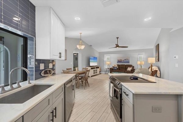 Beautiful, fully-equipped kitchen with new appliances. Kitchen island seats 2