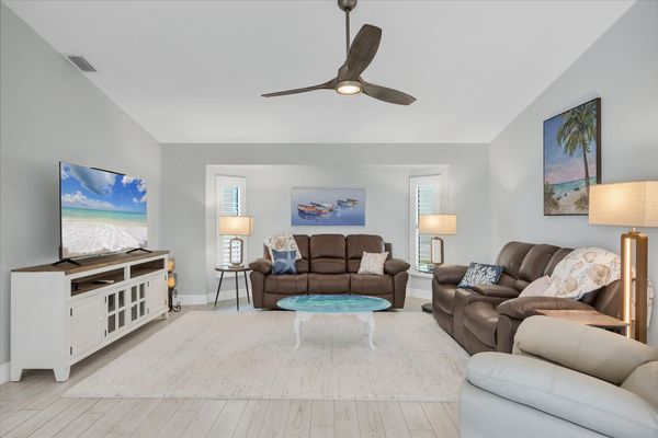 Bright, open living space with 65" TV