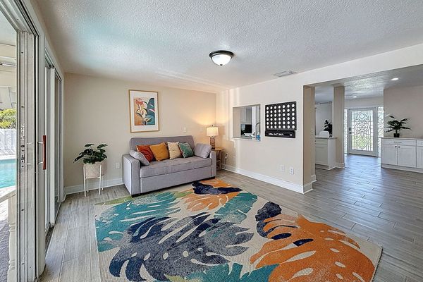 Game Room with sliders to backyard. Sofa Sleeper