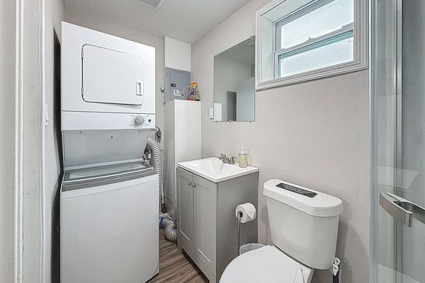 Laundry in Primary Bathroom - Half size stackable washer & dryer