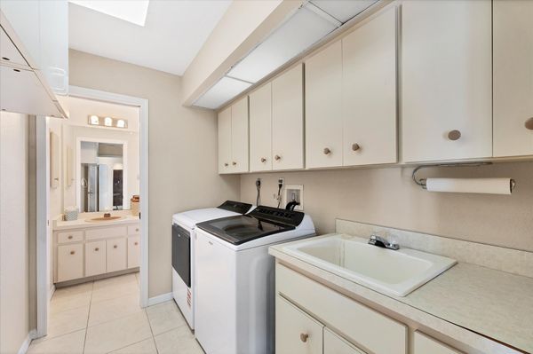 Laundry room with full size washer and dry