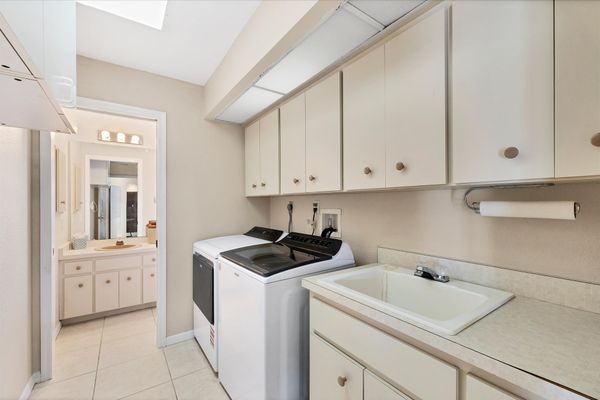 Laundry room with full size washer and dry