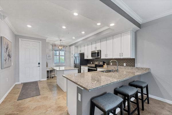 Beautiful, full-equipped kitchen overlooking living and dining areas