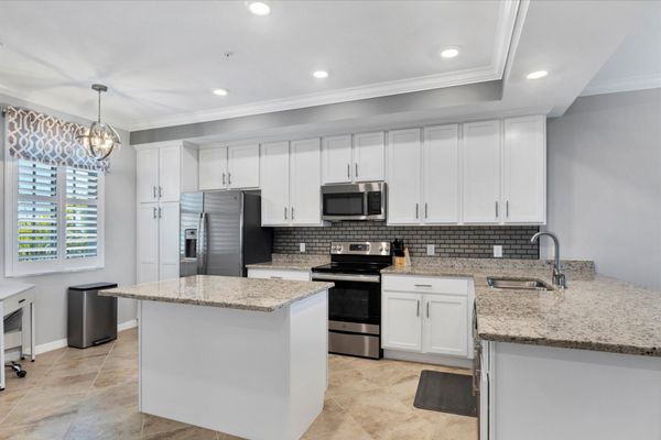 Beautiful, full-equipped kitchen overlooking living and dining areas