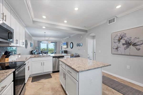 Beautiful, full-equipped kitchen overlooking living and dining areas
