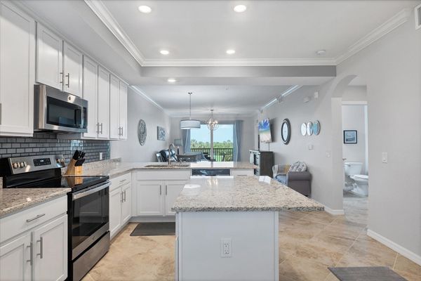 Beautiful, full-equipped kitchen overlooking living and dining areas