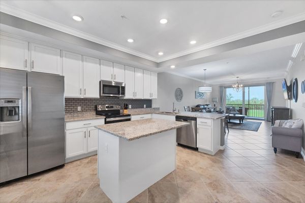 Beautiful, full-equipped kitchen overlooking living and dining areas