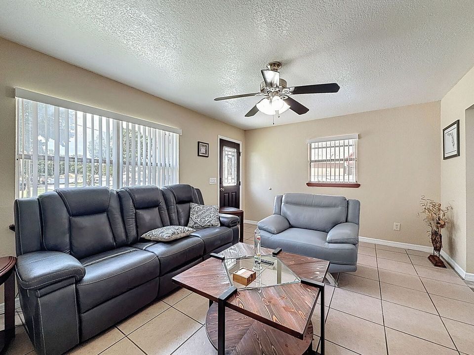 Living Room with reclining leather furniture