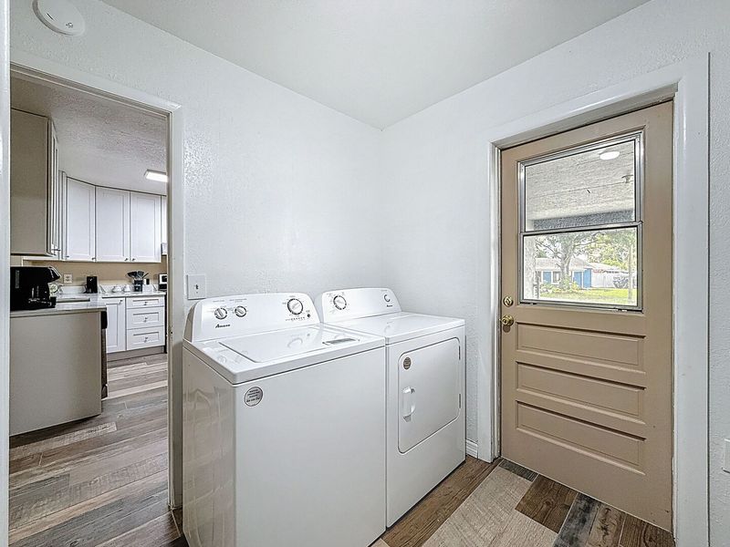 Laundry Room with exit door to the carport