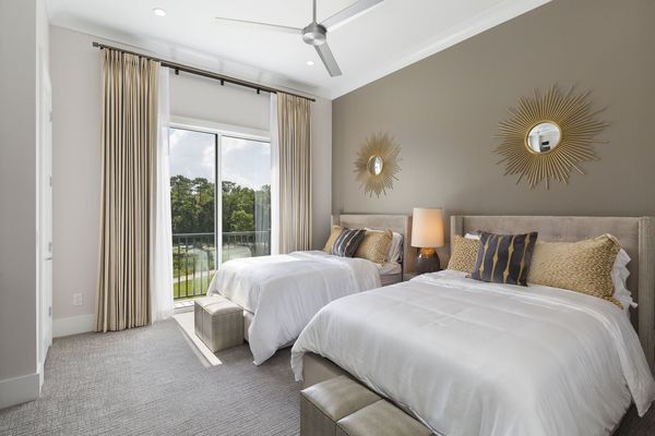 Goldie Double Queen Suite  features two full beds with access to the patio balcony