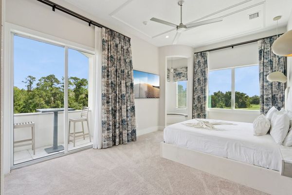 Juliet King Suite bedroom with views to the golf course on the second floor
