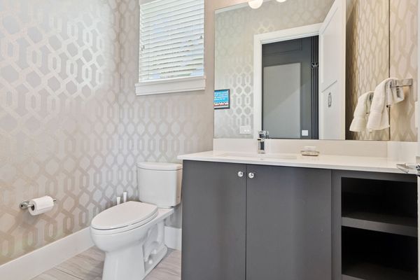 A half bathroom located by the games room