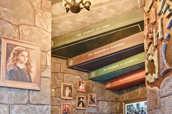 Discover a hidden nook straight out of a wizarding world! Tucked beneath the stairs, this cozy space, perfect for kids to play, read, or let their imagination soar in a secret hideaway.