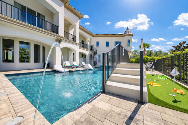 Challenge friends and family to a round of mini-golf on the backyard putting green