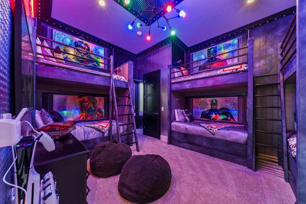Young heroes can team up in this super-powered bedroom, perfect for kids to dream, play, and save the day together.