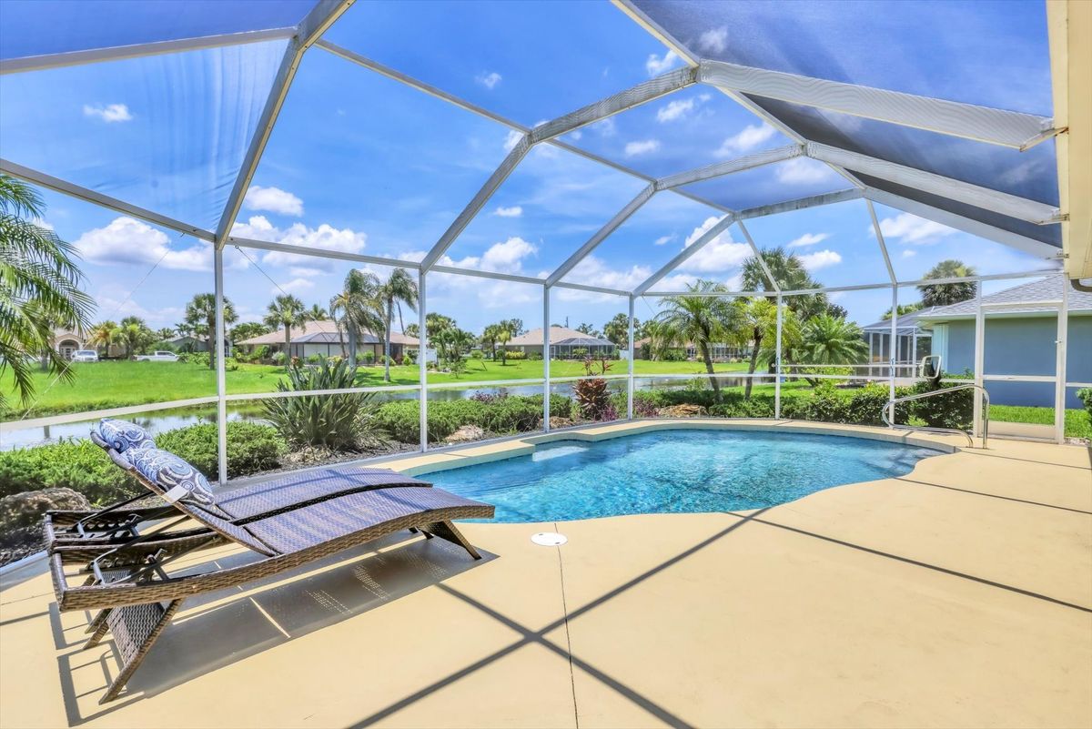 Beautiful 3 bedroom, 2 bathroom waterfront home with private pool in Rotonda West. (Solar Pool Heater)