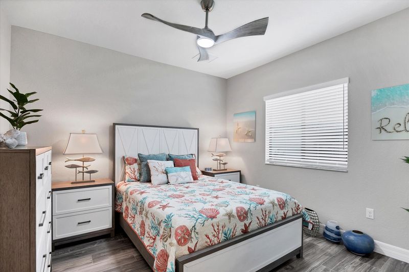 Guest bedroom 2 with a queen bed and 43-inch Smart TV