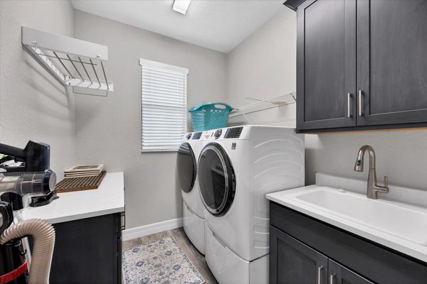 Laundry room with full-size washer and dryer