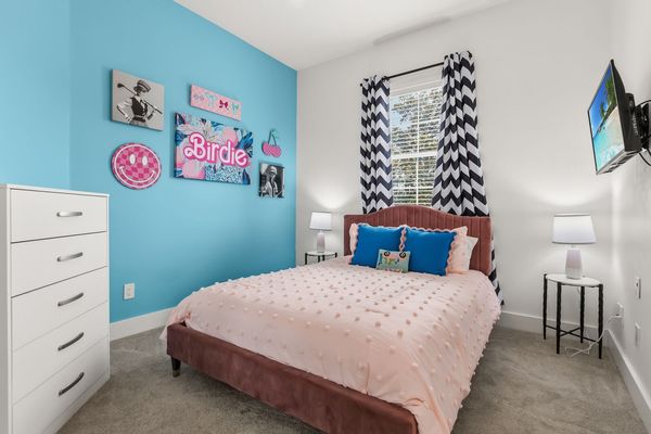 Enjoy this pinkalicious room, perfect for our golfers!