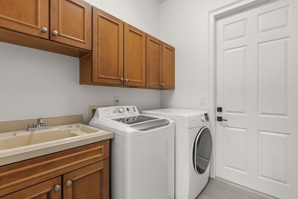 For your convenience, there is a full-sized washer and dryer located on the first floor